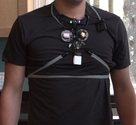 Man wearing the device adjacent to the logo of the My Air My Health Challenge