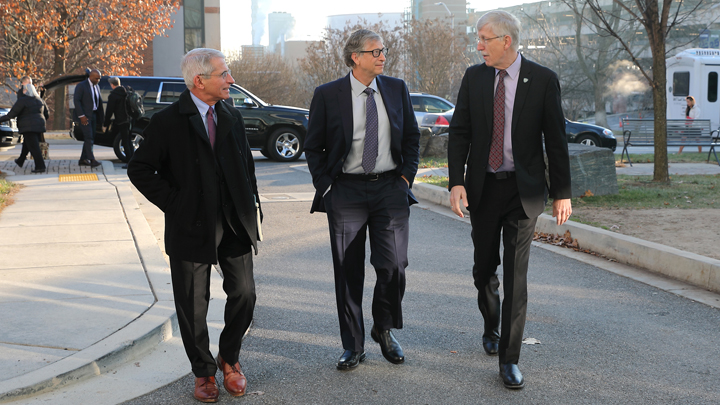 Francis Collins walking with Bill Gates and Tony Fauci