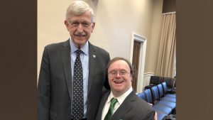 Francis Collins standing with Frank Stephens
