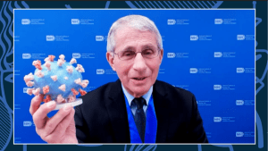 Dr. Fauci holds up a 3D printed model of SARS-CoV-2