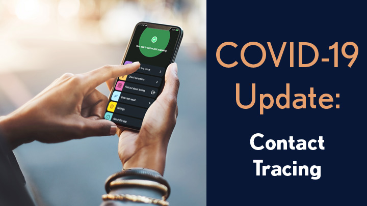 COVID-19 Update: Contact Tracing. Hands hold a smart phone with the NHS COVID-19 app