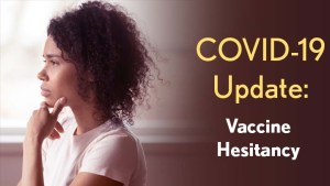 COVID-19 Update: Vaccine Hesitancy. A young black woman looks thoughful.