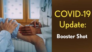 COVID-19 Update: Booster Shot. An arm getting a vaccine